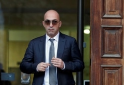 FILE - Maltese businessman Yorgen Fenech, who was arrested in connection with an investigation into the murder of journalist Daphne Caruana Galizia, leaves the Courts of Justice in Valletta, Malta, Nov. 29, 2019.