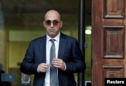 FILE - Maltese businessman Yorgen Fenech, who was arrested in connection with an investigation into the murder of journalist Daphne Caruana Galizia, leaves the Courts of Justice in Valletta, Malta, Nov. 29, 2019.