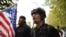 FILE - Members of the Proud Boys and other right-wing demonstrators rally, Sept. 26, 2020, in Portland, Ore.