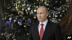 Russian Prime Minister Vladimir Putin wishes Russians a happy New Year, Dec. 31, 2011.