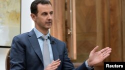 Syria's President Bashar al-Assad is interviewed Feb. 10, 2017, in Syria. With a changing reality on the ground Assad's ouster is no longer the focus of many Western and Arab governments.