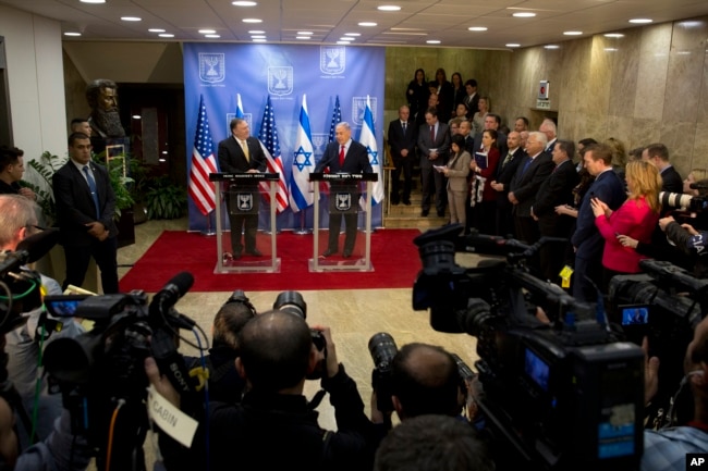 Israeli Prime Minister Benjamin Netanyahu, right, and U.S. Secretary of State Mike Pompeo deliver joint statements at the Prime Minister's office in Jerusalem, March 20, 2019.
