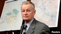 FILE - Former U.S. National Security Adviser Zbigniew Brzezinski arrives to testify before the Senate Foreign Relations Committee on Capitol Hill in Washington, Feb. 1, 2007.