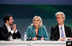 FILE - From left, Italy's The League leader Matteo Salvini, France's National Rally (formerly National Front) leader Marine Le Pen and Dutch Freedom Party leader Geert Wilders, attend a press conference during a convention of European nationalists, in Milan, Italy, Jan. 29, 2016.