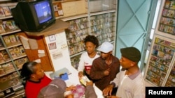 Some Kenyan filmmakers have been inspired by the success of Nigeria's film industry, whose content is available at this shop in Nairobi, July 14, 2006.