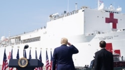 U.S. President Donald Trump salutes the crew of the Navy hospital ship USNS Comfort at Naval Station Norfolk, in Norfolk, Virginia, U.S. March 28, 2020.