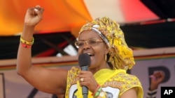 FILE - Zimbabwe's First Lady Grace Mugabe addresses party supporters at a rally in Harare, Nov. 19, 2015.
