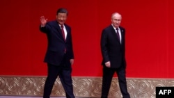资料照：中国领导人习近平在北京接待到访的俄罗斯总统普京。（2024年5月16日）
