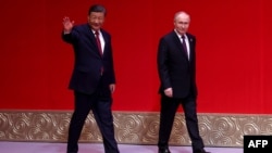资料照片: 2024年5月16日俄罗斯总统普京与中国国家主席习近平出席在北京国家大剧院举行的纪念俄中建交75周年暨中俄文化年开幕音乐会