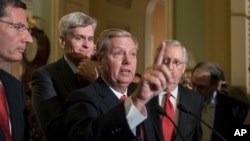 Các Thượng nghị sĩ John Barrasso, Lindsey Graham, Bill Cassidy và Mitch McConnell tại Quốc hội hôm 26/9. 