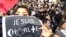 College student Lila Hassan shows her solidarity with France in a selfie from the historic march in Paris’ Place de la Republique, posted on her Twitter account Jan. 11, 2015. (Courtesy Photo / Lila Hassan) 