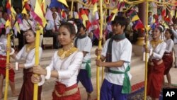 Cambodian dancers perform during a merit making ceremony Tuesday, April 12, 2011, at Cambodia's Ministry of Information in Phnom Penh, Cambodia. The ceremony was held in advance of Cambodian New Year's celebration which lasts for three days, from April 14