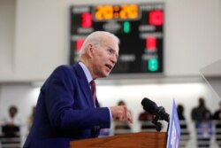 FILE - In this March 9, 2020, file photo, Democratic presidential candidate former Vice President Joe Biden speaks during a campaign rally at Renaissance High School in Detroit.