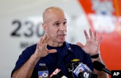 Captain Mark Fedor, a U.S. Coast Guard spokesman, says it was painful to call off the search for El Faro and the 33 people who were aboard. He's shown at an airport in Opa-locka, Fla., Oct. 5, 2015.