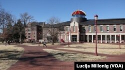 Students walk across campus at the University of Denver in Denver, Colorado.