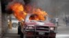 A vehicle that belongs to Radio Tele-Ginen burns during a protest demanding the resignation of President Jovenel Moise in Port-au-Prince, Haiti, June 10, 2019.