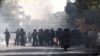 برخورد پلیس ضد شورش با معترضان بحران ارزی در تهران