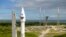 In this image released by NASA, a United Launch Alliance Atlas V rocket with the Lucy spacecraft aboard is rolled out of the Vertical Integration Facility to the launch pad at Space Launch Complex 41, in Cape Canaveral, Fla., Oct. 14, 2021. 