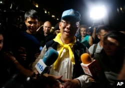 Chiang Rai province acting Gov. Narongsak Osatanakorn, who is leading the ongoing rescue operation of the soccer team and coach trapped in a flooded cave, talks to media during a press conference in Mae Sai, Chiang Rai province, northern Thailand, Tuesday