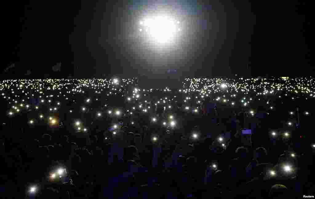 Revelers attend the Nashestvie open-air festival of Russian rock music in Tver region, Russia, July 9, 2016.