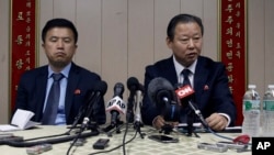 FILE - Ambassador of the Permanent Mission of the Democratic People's Republic of Korea to the United Nations Jang Il Hun, right, is joined by councilor Kwon Jong Gun as he speaks during a new conference, July 28, 2015, at the DPRK mission in New York.