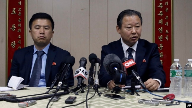 FILE - Ambassador of the Permanent Mission of the Democratic People's Republic of Korea to the United Nations Jang Il Hun, right, is joined by councilor Kwon Jong Gun as he speaks during a new conference, July 28, 2015, at the DPRK mission in New York.