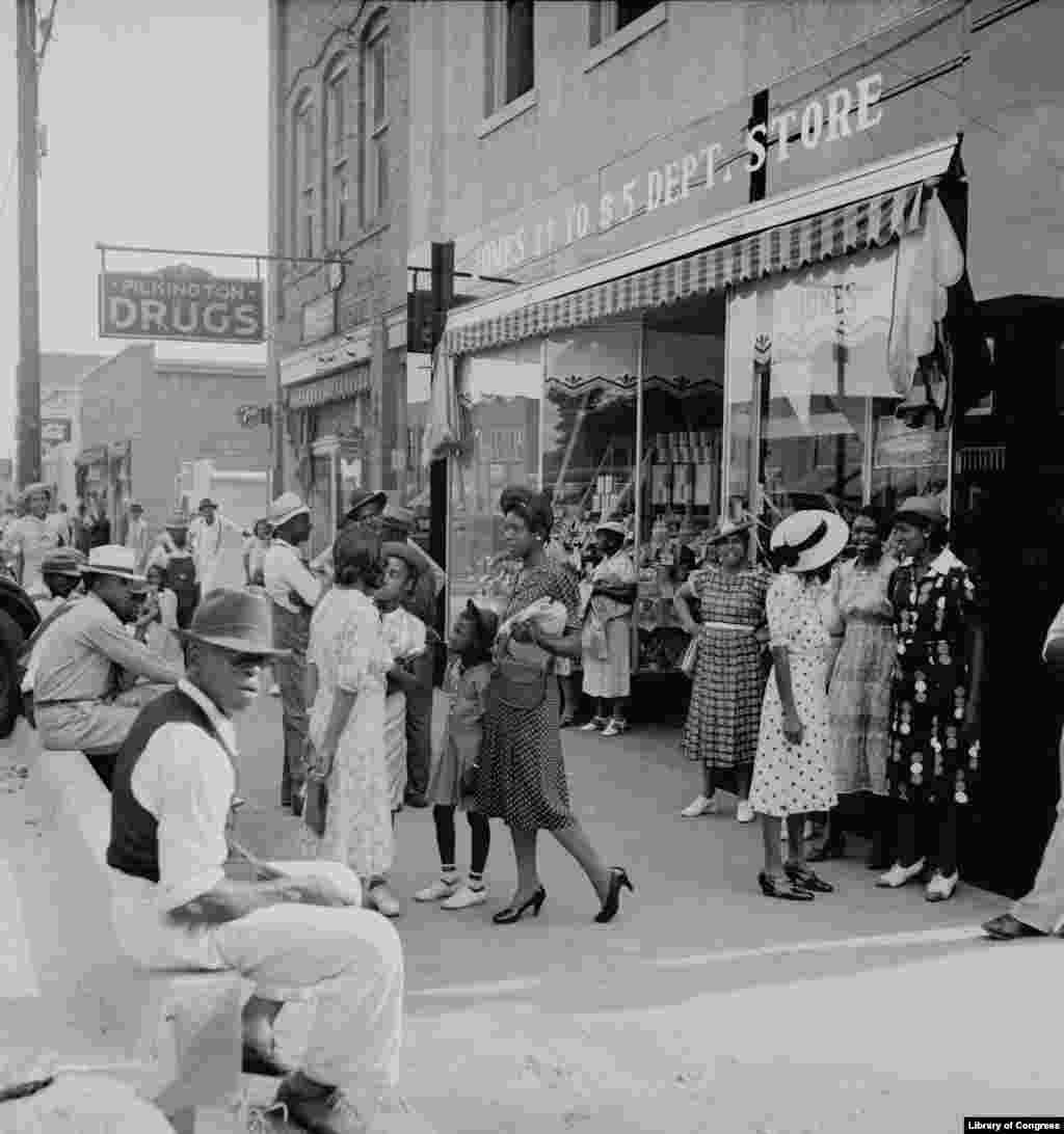 "Saturday Afternoon Shopping and Visiting on Main Street of Pittsboro North Carolina," by Dorothea Lange, 1939. (Photo credit: Prints & Photographs Division, Library of Congress)
