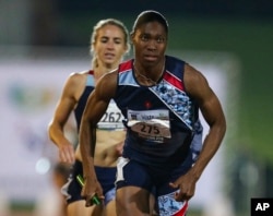 In this photo taken April 27, 2019, South Africa's athlete Caster Semenya competes in an event at a meeting in Johannesburg.