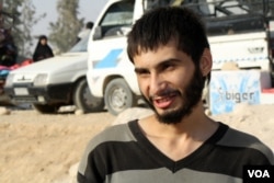 Yazan Abdulrahman Mohammad Ali, 20, escaped from Raqqa less than two weeks ago and was detained for ten days before being freed. But his family is dead, and his home is destroyed on Oct. 25, 2017, in Ain Issa, Syria. (H. Murdock/VOA)