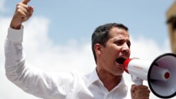 Lãnh đạo phe đối lập Venezuela Juan Guaido phát biểu trong một cuộc tập hợp biểu tình phản đối Tổng thống Venezuela Nicolas Maduro ở Caracas, ngày 9 tháng 3, 2019.