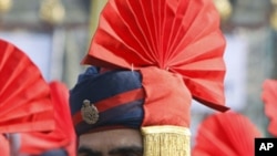 A policeman attends a ceremony to mark India's Republic Day celebrations in Srinagar, January 26, 2011.