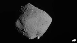 FILE - In this Nov. 13, 2019, file image released by the Japan Aerospace Exploration Agency (JAXA), shows asteroid Ryugu taken by Japan's Hayabusa2 spacecraft. (JAXA via AP, File)