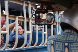 Hy Sokhom is pictured in his tuk tuk in Kien Svay district, Kandal province, Cambodia, April 12, 2020. (Phorn Bopha/VOA Khmer)