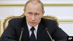 Russian Prime Minister Vladimir Putin chairs a Cabinet meeting in Moscow, 25 Jan 2011