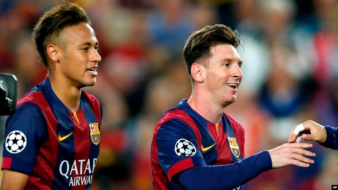 Barcelona's Neymar, left, and Lionel Messi celebrate after winning 3-0 in the Champions League semifinal first leg soccer match between Barcelona and Bayern Munich at the Camp Nou stadium in Barcelona, Spain, Wednesday, May 6, 2015. (AP Photo/Manu Fernand