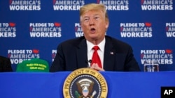 President Donald Trump speaks during a roundtable discussion on workforce development at Northeast Iowa Community College, in Peosta, Iowa, July 26, 2018. 