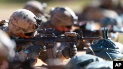 FILE - U.S. Army soldiers hone their long-distance marksmanship skills as they train at Ft. Benning in Columbus, Georgia, Oct. 17, 2017.