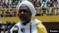 FILE - Mahmoud Dicko, the head of Mali's High Islamic Council, speaks during a rally at in Bamako, Aug. 12, 2012.