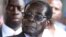 FILE - Zimbabwe President Robert Mugabe addresses supporters outside ZANU-PF headquarters.