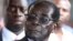 Zimbabwe President Robert Mugabe addresses supporters outside ZANU-PF headquarters, Harare, Oct. 30, 2014.