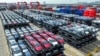 FILE - The file photo taken on Sept. 11, 2023 shows BYD electric cars waiting to be loaded on a ship stacked at the international container terminal of Taicang Port at Suzhou Port, in China’s eastern Jiangsu Province.