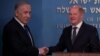 Izraelski premijer Benjamin Netanyahu i njemački kancelar Olaf Scholz rukuju se nakon govora u Jerusalimu, 17. marta 2024.
