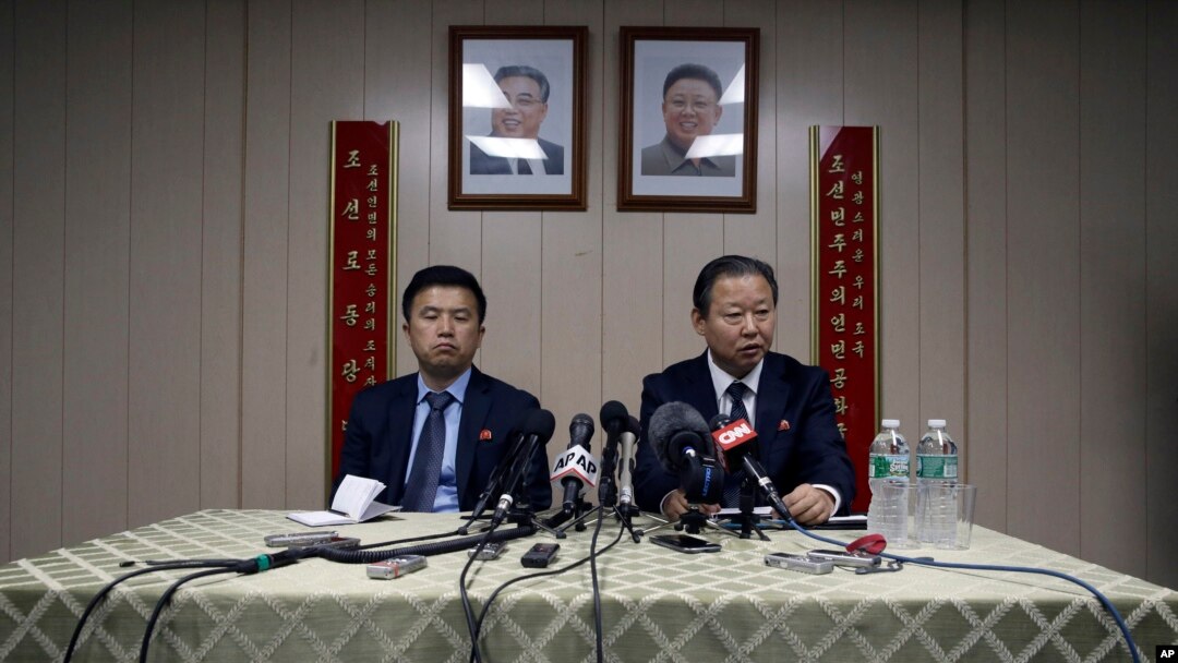 Ambassador of the Permanent Mission of the Democratic People's Republic of Korea to the United Nations Jang Il Hun, right, is joined by councilor Kwon Jong Gun as he speaks during a new conference, July 28, 2015, at the DPRK mission in New York. 