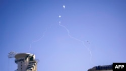 Israel's Iron Dome missile defense system intercepts incoming projectiles over Tel Aviv on Oct. 23, 2024, amid the ongoing war between Israel and Hezbollah.