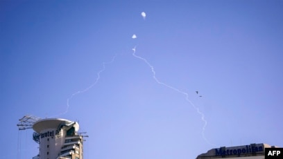 Israel's Iron Dome missile defense system intercepts incoming projectiles over Tel Aviv on Oct. 23, 2024, amid the ongoing war between Israel and Hezbollah.