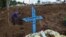 A man digs a grave at the Parque Taruma cemetery in Manaus, Brazil, for an inmate killed in a prison riot, Jan. 4, 2017. Forensic experts said that half the slain inmates were beheaded and several others were dismembered.