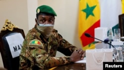 FILE - Colonel Assimi Goita, leader of Malian military junta, attends an Economic Community of West African States (ECOWAS) consultative meeting in Accra, Ghana, Sept. 15, 2020.