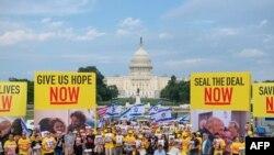 Protesters and family members of Israelis held hostage since the October 7 attack by Hamas militants hold a rally outside of the US Capitol on the National Mall on July 23, in Washington, DC.