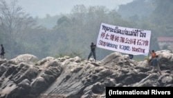 Activists protest against a Beijing-backed project to dredge and blow open a stretch of the Mekong River in northern Thailand in January 2017. (International Rivers)