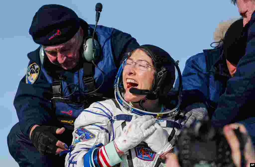 U.S. astronaut Christina Koch reacts shortly after the landing of the Russian Soyuz MS-13 space capsule, about 150 kilometers southeast of the Kazakh town of Zhezkazgan, Kazakhstan. Koch wrapped up a 328-day mission on her first flight into space.